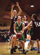 1 May 2001; Edel Fitzsimons of Scoil Dara in action against Carol O'Connor,10, and Fiona Healy, 6, Loreto Abbey during the Cadbury's Time Out All Ireland Schools &quot;C&quot; Final between Loreto Abbey Dalkey, Dublin, and Scoil Dara Kilcock, Kildare at the National Basketball Arena in Tallaght, Dublin. Photo by Brendan Moran/Sportsfile