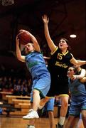 1 May 2001; Amanda Farrelly of St Joseph's in action against Breda Cronin of Rathmore Community School during the Cadbury's Time Out All-Ireland Girls Senior &quot;C&quot; Final match between St Joseph's, Stanhope St v Rathmore Community School at the National Basketball Arena in Tallaght, Dublin. Photo by Brendan Moran/Sportsfile