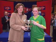 2 May 2001; Castleisland captain Mary Ellen Scanlon is presented with the cup by Helen King, Cadbury's Ireland, after the Cadbury's Time Out All-Ireland Senior &quot;A&quot; Schools Final match between St Joseph's Castleisland v St Mary's Mallow at the National Basketball Arena in Tallaght, Dublin. Photo by Brendan Moran/Sportsfile