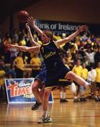1 May 2001; Bilbhe Brady of Magh Ene College, Bundoran, in action against Deirdre Bradshaw of St Joseph's College, Borrisoleigh, during the Cadbury's TimeOut All-Ireland Cadette D Schools Final match between Rathmore Community School and St Joseph's Stanhope Street at the National Basketball Arena in Tallaght, Dublin. Photo by Brendan Moran/Sportsfile