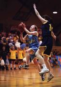 1 May 2001; Aileen Kennedy of St Joseph's College, Borrisoleigh, in action against Donna Moonan, Magh Ene College, Bundoran, during the Cadbury's TimeOut All-Ireland Cadette D Schools Final match between Rathmore Community School and St Joseph's Stanhope Street at the National Basketball Arena in Tallaght, Dublin. Photo by Brendan Moran/Sportsfile