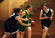 2 May 2001; Tara Brosnan of St Joseph's in action against Julie Hurley, 7, and Miriam Byrne of St Mary's during the Cadbury's Time Out All-Ireland Senior &quot;A&quot; Schools Final match between St Joseph's Castleisland v St Mary's Mallow at the National Basketball Arena in Tallaght, Dublin. Photo by Brendan Moran/Sportsfile