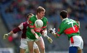 29 April 2001; Kevin Cahill of Mayo passes the ball to team-mate Noel Connelly during the Allianz GAA National Football League Division 1 Final match betweem Mayo and Galway at Croke Park in Dublin. Photo by Ray McManus/Sportsfile