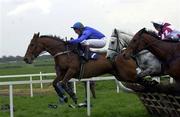 26 April 2001; Joking Aside, with Charlie Swan up, jump the first during the Weatherbys Hurdle at Fairyhouse Racecourse in Meath. Photo by Matt Browne/Sportsfile