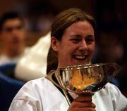 1 May 2001; A delighted Elaine Malone, captain of Loreto College, with the cup after the Cadbury's Time Out All-Ireland Cadette B Schools Final match between Loreto College Navan and Scoil Mhuire Carrick On Suir at the National Basketball Arena in Tallaght, Dublin. Photo by Brendan Moran/Sportsfile