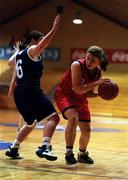 1 May 2001; Claire Cunningham of Scoil Mhuire in action against Jackie Shiels of Loreto College during the Cadbury's Time Out All-Ireland Cadette B Schools Final match between Loreto College Navan and Scoil Mhuire Carrick On Suir at the National Basketball Arena in Tallaght, Dublin. Photo by Brendan Moran/Sportsfile