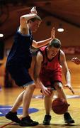 3 May 2001; Shane Campbell of Cnoc Mhuire in action against Tommy Canavan of St Gerald's College during the Cadbury's TimeOut All-Ireland Under 19 'B' Schoolboys Final match between Cnoc Mhuire Granard, Longford, and St Gerard's Castlebar, Mayo, at the National Basktetball Arena in Tallaght, Dublin. Photo by Brendan Moran/Sportsfile