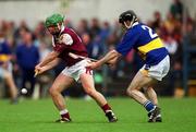28 April 2001; Fergal Healy of Galway is tackled by Thomas Costello of Tipperary during the Allianz GAA National Hurling League Division 1 Semi-Final match between Galway and Tipperary at Cusack Park in Ennis, Clare. Photo by Ray McManus/Sportsfile