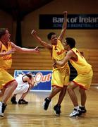 4 May 2001; Isaac Westbrooks, 4, of St Fintan's is congratulated by team-mates Michael Westbrooks, right, and Conor Kirwan after scoring the game winning basket on the final buzzer in the Cadbury's Time Out All Ireland Under 19 'A' Schoolboys Final match between De La Salle College, Waterford and St Fintan's High School, Sutton, at the National Basketball Arena in Tallaght, Dublin. Photo by Brendan Moran/Sportsfile