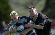 5 May 2001; John Davis of Shannon is tackled by Andrew Maxwell of Ballymena, as he goes over for a try during the AIB All-Ireland League Division 1 match between Ballymena and Shannon at Ballymena Rugby Club in Antrim. Photo by Matt Browne/Sportsfile