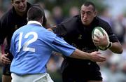 6 May 2001; Mutu Ngarimu of Young Munster holds off the challenge of Cian Foley Garryowen during the AIB All-Ireland League Division 1 match between Garryowen RFC and Young Munster RFC at Tom Clifford Park in Dooradoyle, Limerick. Photo by Brendan Moran/Sportsfile