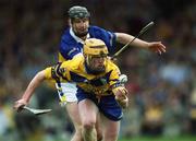 6 May 2001; Niall Gilligan of Clare in action against Philip Maher of Tipperary during the Allianz National Hurling League Final match between Tipperary and Clare at the Gaelic Grounds in Limerick. Photo by Ray McManus/Sportsfile