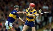 6 May 2001; Brian Lohan of Clare in action against Eddie Enright of Tipperary during the Allianz National Hurling League Final match between Tipperary and Clare at the Gaelic Grounds in Limerick. Photo by Ray McManus/Sportsfile
