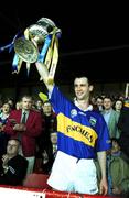 6 May 2001; Tipperary captain Thomas Dunne lifts the trophy after the Allianz National Hurling League Final match between Tipperary and Clare at the Gaelic Grounds in Limerick. Photo by Brendan Moran/Sportsfile *** Local Caption ***