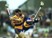 6 May 2001; Gerry Quinn of Clare in action against Eddie Enright of Tipperary during the Allianz National Hurling League Final match between Tipperary and Clare at the Gaelic Grounds in Limerick. Photo by Ray McManus/Sportsfile