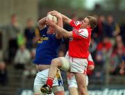 6 May 2001; Niall Sheridan of Longford in action against Arthur O'Connor of Louth during the Bank of Ireland Leinster Senior Football Championship First Round match between Louth and Longford at Páirc Tailteann in Navan, Meath. Photo by Damien Eagers/Sportsfile
