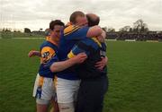 6 May 2001; Longford manager Michael McCormack, right, celebrates with his players Niall Sheridan, centre, and James Martin after the Bank of Ireland Leinster Senior Football Championship First Round match between Louth and Longford at Páirc Tailteann in Navan, Meath. Photo by Damien Eagers/Sportsfile