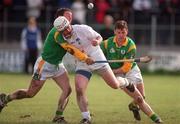 29 April 2001; Cathal Sheridan of Kildare is tackled by Anton O'Neill, left, and Paul Donnelly of Meath during the Guinness Leinster Senior Hurling Championship Preliminary Round match between Kildare and Meath at Conneff Park in Clane, Kildare. Photo by Aoife Rice/Sportsfile