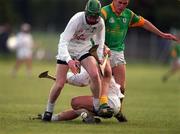 29 April 2001; Richie Hoban of Kildare is tackled by Nicky Horan of Meath during the Guinness Leinster Senior Hurling Championship Preliminary Round match between Kildare and Meath at Conneff Park in Clane, Kildare. Photo by Aoife Rice/Sportsfile