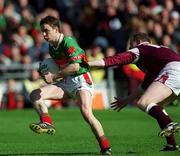 29 April 2001; Ray Connelly of Mayo is tackled by John Donnellan of Galway during the Allianz GAA National Football League Division 1 Final match betweem Mayo and Galway at Croke Park in Dublin. Photo by Ray Lohan/Sportsfile