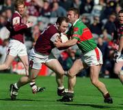 29 April 2001; John Divilly of Galway is tackled by Colm McManaman of Mayo during the Allianz GAA National Football League Division 1 Final match betweem Mayo and Galway at Croke Park in Dublin. Photo by Ray Lohan/Sportsfile