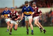 28 April 2001; Philip Maher of Tipperary in action against Kevin Broderick of Galway, left, during the Allianz GAA National Hurling League Division 1 Semi-Final match between Galway and Tipperary at Cusack Park in Ennis, Clare. Photo by Ray McManus/Sportsfile