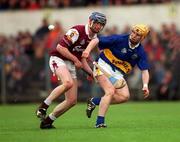 28 April 2001; Conor Gleeson of Tipperary in action against Mark Kerins of Galway during the Allianz GAA National Hurling League Division 1 Semi-Final match between Galway and Tipperary at Cusack Park in Ennis, Clare. Photo by Ray McManus/Sportsfile