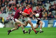29 April 2001; Ciaran O'Sullivan of Cork in action against Brian Morley, right, and Damien Healy of Westmeath during the Allianz GAA National Football League Division 2 Final match between Westmeath and Cork at Croke Park in Dublin. Photo by Ray Lohan/Sportsfile