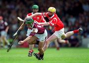 6 May 2001; Kenneth Burke of Galway is tackled by Brian Moloney of Cork during the All-Ireland Vocational Schools Hurling Final match between Cork and Galway at the Gaelic Grounds in Limerick. Photo by Ray McManus/Sportsfile