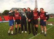 9 May 2001; Richard MacMillan, General Manager Adecco Recruitment Ireland, pops the champagne at Dalymount Park with Bohemians manager Roddy Collins and players, from left, Kevin Hunt, Dave Morrison, Alex Nesovic and Trevor Molly at the announcement that Adecco renews its sponsorship of Bohemians for the 2001/2002 season. Photo by David Maher/Sportsfile
