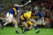 6 May 2001; Ollie Baker of Clare in action against Conor Gleeson of Tipperary during the Allianz National Hurling League Final match between Tipperary and Clare at the Gaelic Grounds in Limerick. Photo by Brendan Moran/Sportsfile *** Local Caption ***