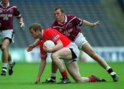 29 April 2001; Nicholas Murphy of Cork is challenged by David O'Shaughnessy of Westmeath during the Allianz GAA National Football League Division 2 Final match between Westmeath and Cork at Croke Park in Dublin. Photo by Ray McManus/Sportsfile