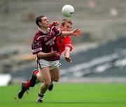 29 April 2001; Fergel Wilson of Westmeath is challenged by Nicholas Murphy of Cork during the Allianz GAA National Football League Division 2 Final match between Westmeath and Cork at Croke Park in Dublin. Photo by Ray McManus/Sportsfile