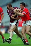 29 April 2001; Paul Conway of Westmeath is tackled by Michael O'Sullivan of Cork during the Allianz GAA National Football League Division 2 Final match between Westmeath and Cork at Croke Park in Dublin. Photo by Ray Lohan/Sportsfile