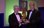 10 May 2001; Gerry O'Sullivan, Director of eircom Group Corporate Relations, presents the eircom Soccer Writers' Association of Ireland personality of the year award for 2001 to Glen Crowe of Bohemians at the Conrad Hotel in Dublin. Photo by David Maher/Sportsfile