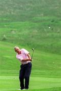 11 May 2001; Denis O'Sullivan plays off the fairway on to the 8th green during the AIB Irish Seniors Open at Powerscourt Golf Club in Wicklow. Photo by Matt Browne/Sportsfile