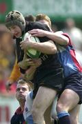 12 May 2001; Kieran Gallagher of Young Munster, is tackled by Robin Morrow and Andy Park of Belfast Harlequins during the AIB All-Ireland League Division 1 match between Young Munster RFC and Belfast Harlequins RFC at Tom Clifford Park in Dooradoyle, Limerick. Photo by Brendan Moran/Sportsfile