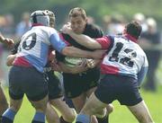 12 May 2001; Leo Doyle of Young Munster is tackled by Niall Malone and Simon Dick, right, of Belfast Harlequins during the AIB All-Ireland League Division 1 match between Young Munster RFC and Belfast Harlequins RFC at Tom Clifford Park in Dooradoyle, Limerick. Photo by Brendan Moran/Sportsfile