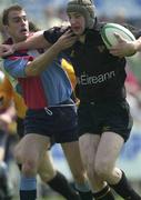 12 May 2001; Kieran Gallagher of Young Munster holds off the challenge of Andy Park of Belfast Harlequins during the AIB All-Ireland League Division 1 match between Young Munster RFC and Belfast Harlequins RFC at Tom Clifford Park in Dooradoyle, Limerick. Photo by Brendan Moran/Sportsfile