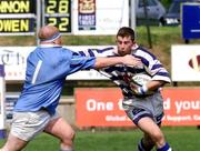 12 May 2001; Alistair Boyde of Dungannon is tackled by Niall Hartigan of Garryowen during the AIB All-Ireland League Division 1 match between Dungannon RFC and Garryowen RFC at Stevenson Park in Dungannon, Tyrone. Photo by Sportsfile