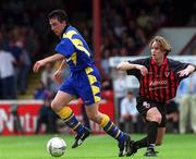 13 May 2001; Stephen Kelly of Longford Town in action against Kevin Hunt of Bohemians during the Harp Lager FAI Cup Final match between Bohemians and Longford Town at Tolka Park in Dublin. Photo by David Maher/Sportsfile