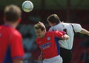 6 May 2001; Declan Daly of Cork City in action against Stephen Geoghegan of Shelbourne during the Eircom League Premier Division match between Shelbourne and Cork City at Tolka Park in Dublin. Photo by David Maher/Sportsfile