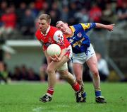 6 May 2001; Aaron Hoey of Louth in action against Padraic Davis of Longford during the Bank of Ireland Leinster Senior Football Championship First Round match between Louth and Longford at Páirc Tailteann in Navan, Meath. Photo by Damien Eagers/Sportsfile
