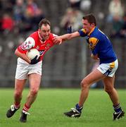 6 May 2001; Seamus O'Hanlon of Louth holds off the challenge of Ian Browne of Longford during the Bank of Ireland Leinster Senior Football Championship First Round match between Louth and Longford at Páirc Tailteann in Navan, Meath. Photo by Damien Eagers/Sportsfile