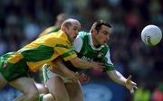 13 May 2001; Stephen Maguire of Fermanagh in action against Eamon Doherty of Doherty during the Bank of Ireland Ulster Senior Football Championship Preliminary Round match between Donegal and Fermanagh at MacCumhaill Park in Ballybofey, Donegal. Photo by Damien Eagers/Sportsfile