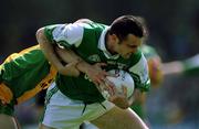13 May 2001; Stephen Maguire of Fermanagh is challenged by Eamon Doherty of Donegal during the Bank of Ireland Ulster Senior Football Championship Preliminary Round match between Donegal and Fermanagh at MacCumhaill Park in Ballybofey, Donegal. Photo by Damien Eagers/Sportsfile