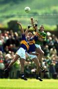 13 May 2001; Darragh Ó Sé of Kerry competes for a dropping ball against Kevin Mulryan, centre, and Sean Collum of Tipperary during the Bank of Ireland Munster Senior Football Championship Quarter-Final match between Tipperary and Kerry at Ned Hall Park in Clonmel, Tipperary. Photo by Brendan Moran/Sportsfile