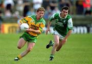 13 May 2001; Brian Roper of Donegal in action against Michael Lilly of Fermanagh during the Bank of Ireland Ulster Senior Football Championship Preliminary Round match between Donegal and Fermanagh at MacCumhaill Park in Ballybofey, Donegal. Photo by Damien Eagers/Sportsfile