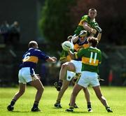 13 May 2001; Darragh Ó Sé competes for a dropping ball with Kevin Mulryan of as Sean Collum, 6, and and Maurice Fitzgerald, 11, look on during the Bank of Ireland Munster Senior Football Championship Quarter-Final match between Tipperary and Kerry at Ned Hall Park in Clonmel, Tipperary. Photo by Brendan Moran/Sportsfile