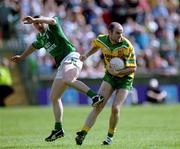 13 May 2001; Paul McGonigle of Donegal in action against Neil Cox of Fermanagh during the Bank of Ireland Ulster Senior Football Championship Preliminary Round match between Donegal and Fermanagh at MacCumhaill Park in Ballybofey, Donegal. Photo by Damien Eagers/Sportsfile